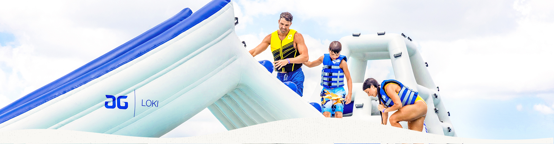 a man and boy in life vests on a floating raft