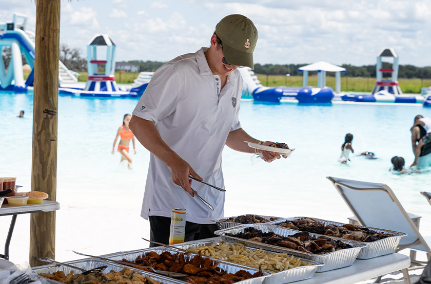 a man standing at a buffet