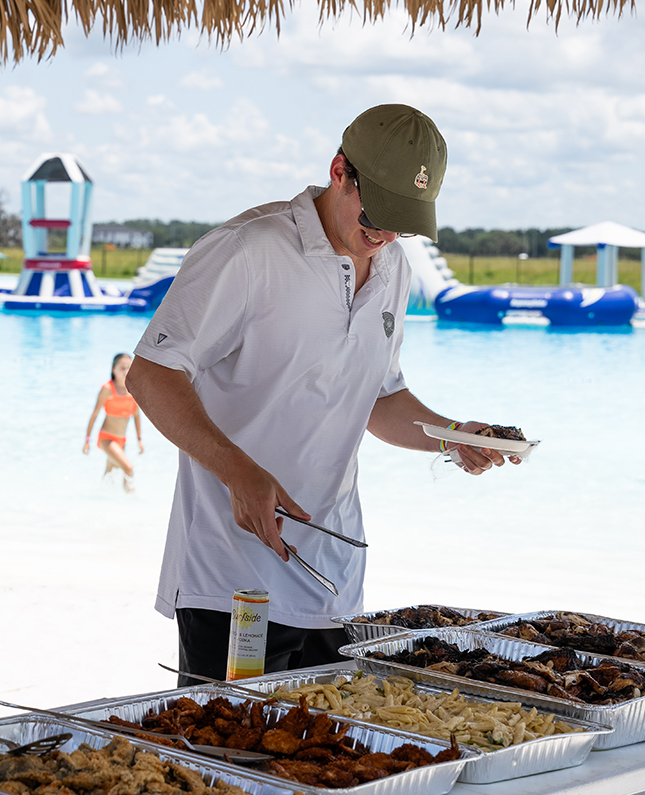 a man standing at a buffet
