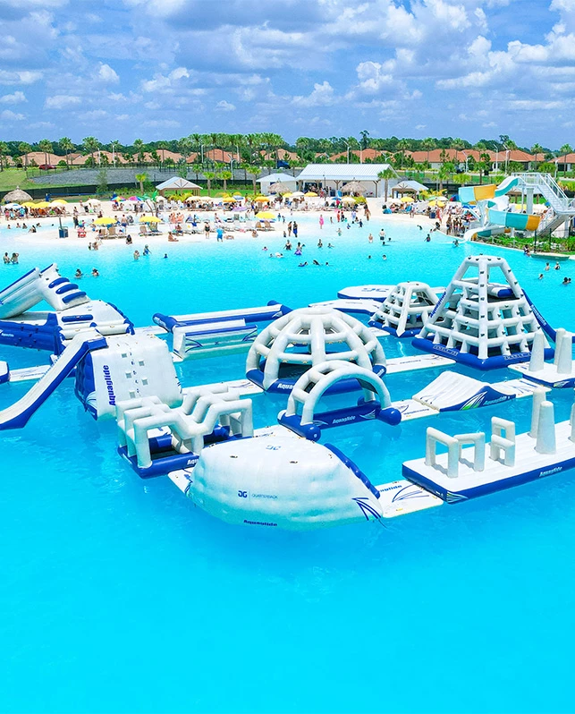 a water park with a large inflatable water slide