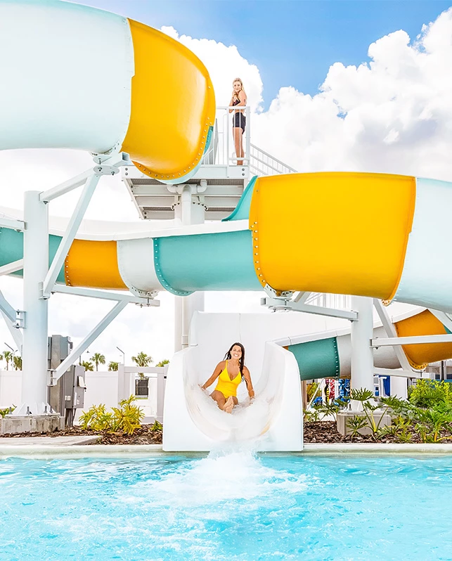 a woman on a water slide