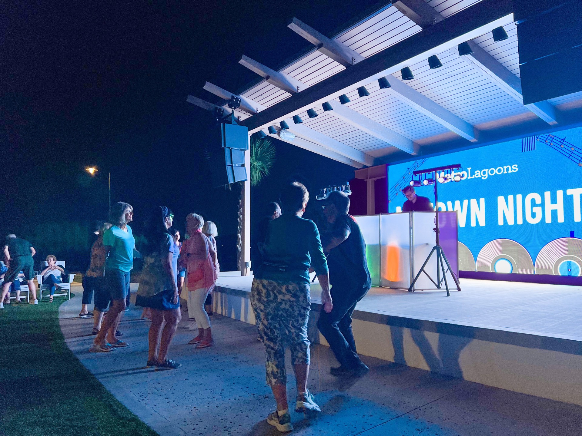a group of people standing on a stage