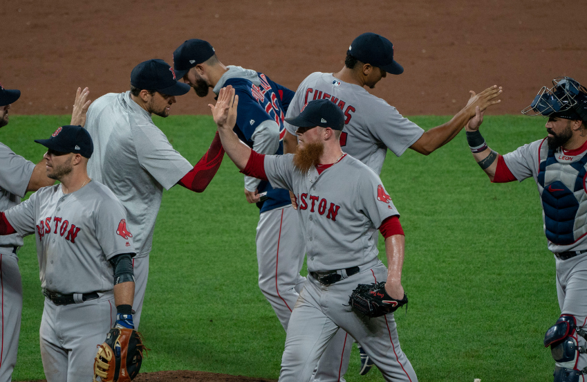 a group of baseball players on a field