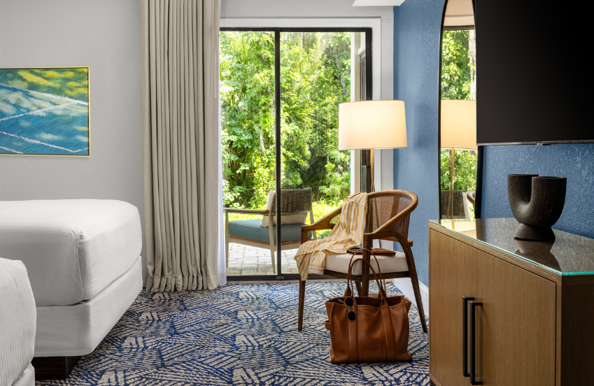 a room with a chair and a lamp
