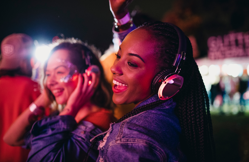 a group of women wearing headphones