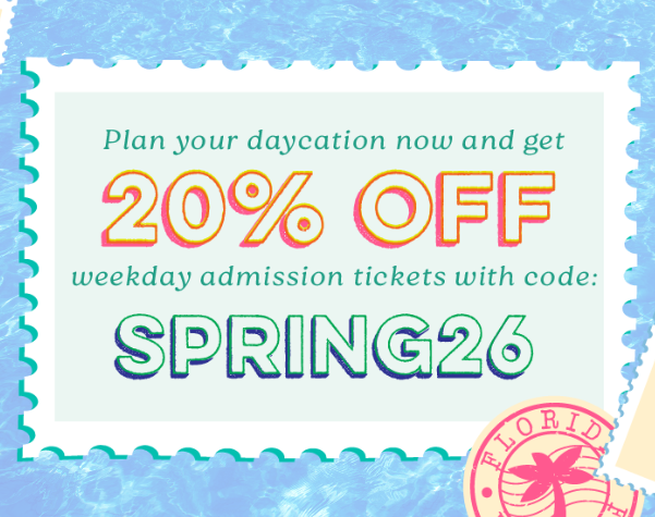 a white rectangular sign with text and a pink and green circle