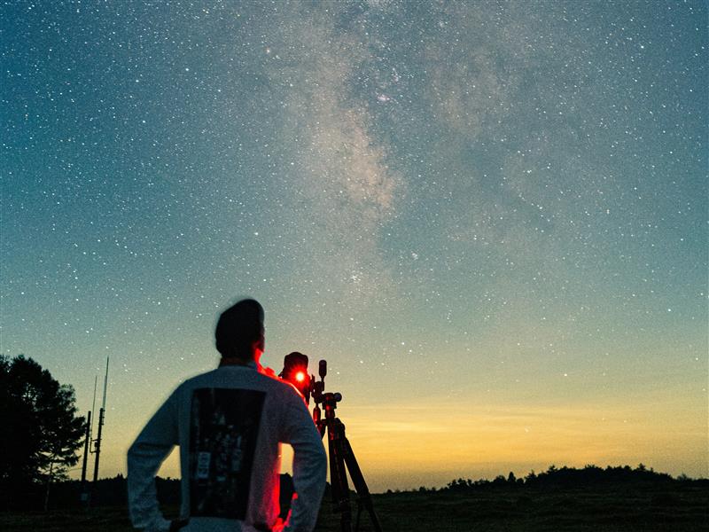 a man looking at a camera