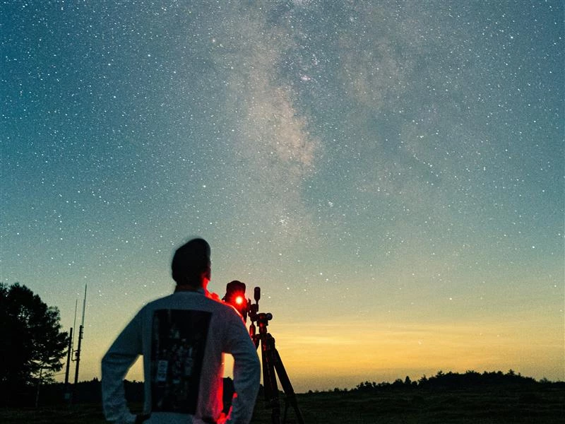 a man looking at a camera