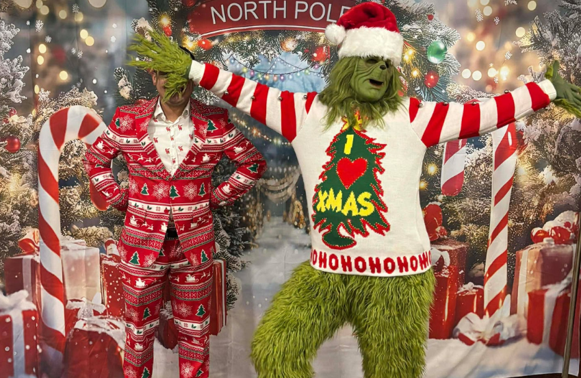 two people in clothing posing for the camera