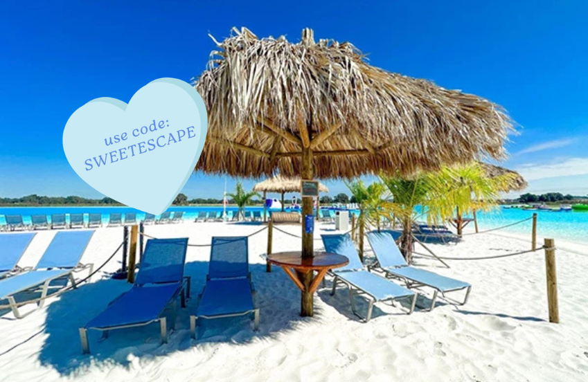 a beach with chairs and umbrellas