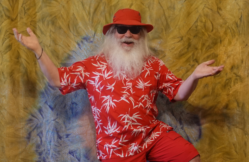 a man wearing a red hat and sunglasses
