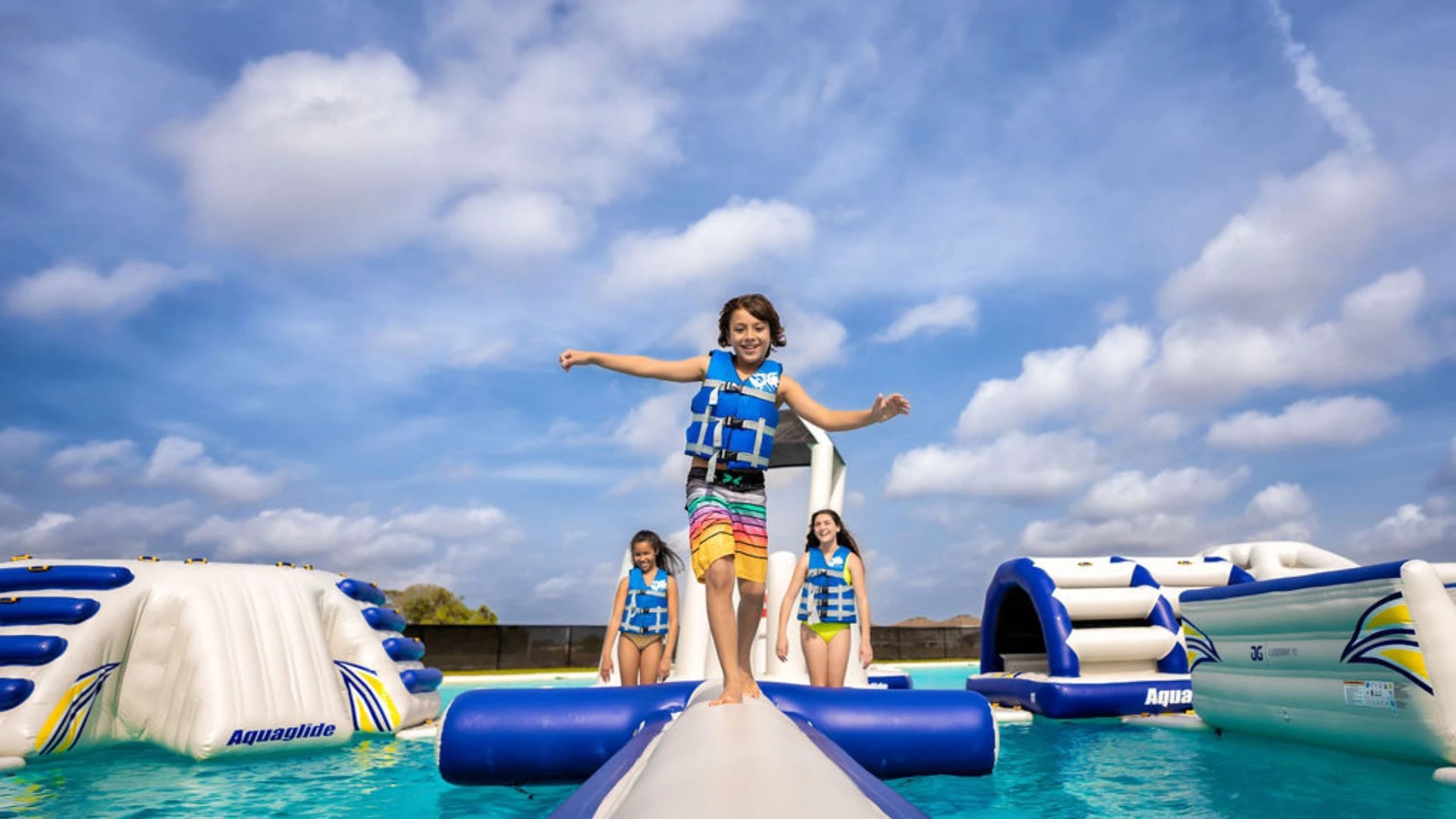 a group of people on a floating raft