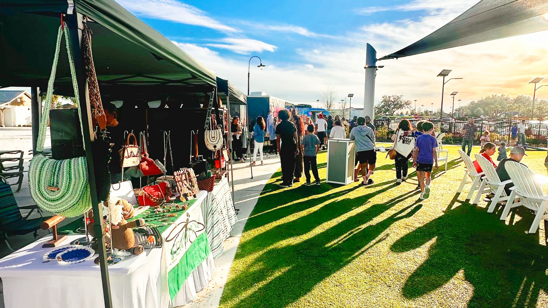 a group of people walking on grass