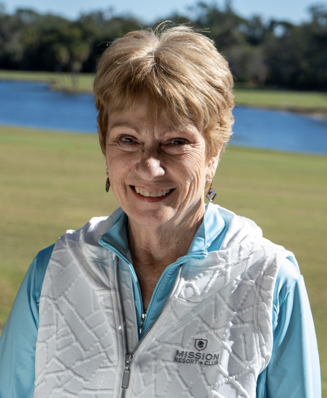 a woman smiling at camera