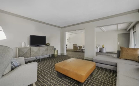 a room with a television and couches