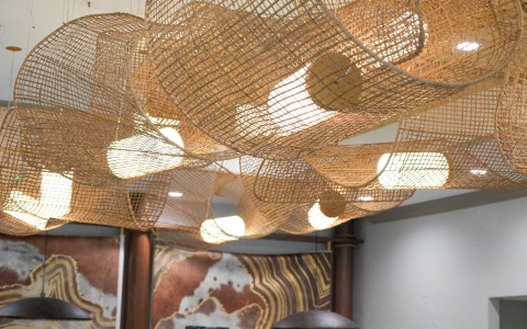 a light fixture from the ceiling