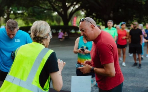 a man talking to a woman