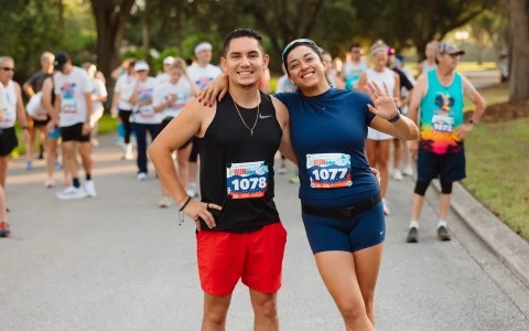 a man and woman posing for a picture