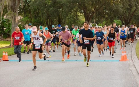 a group of people running on a road