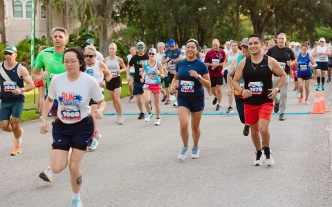 a group of people running on a road