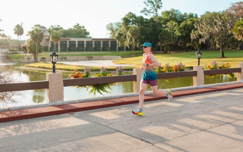 a person running on a bridge