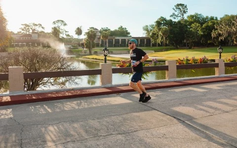 a man running on a bridge