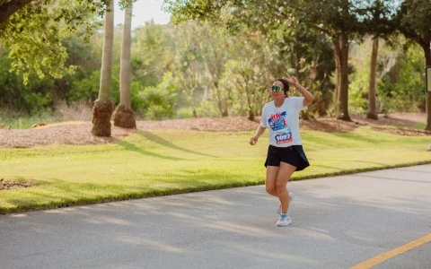 a woman running on a road