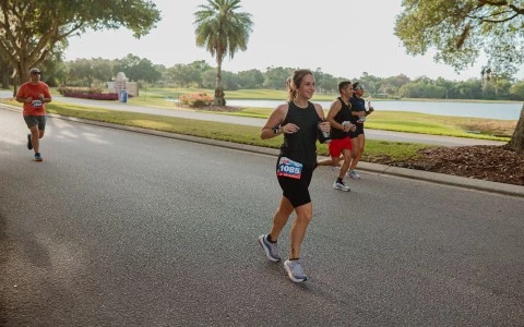 a group of people running on a road