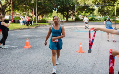 a woman running in a race