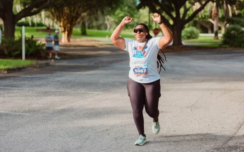 a woman running in a race