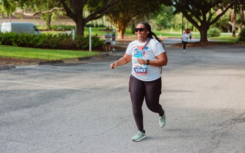 a woman running in a race