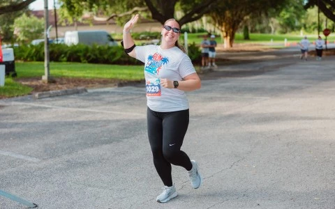 a woman running in a race