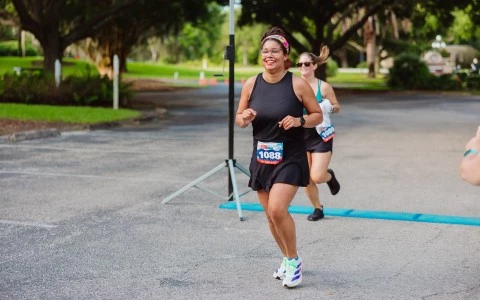 a group of women running in a race