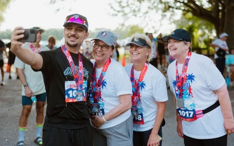 a group of people wearing matching lanyards