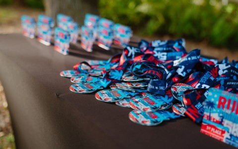 a group of badges on a table