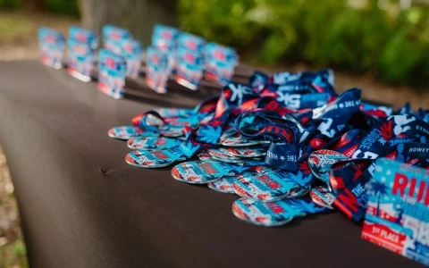 a group of badges on a table