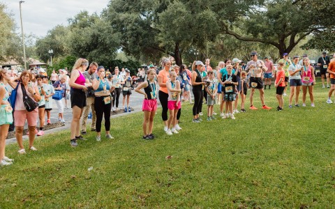 a group of people standing in a line