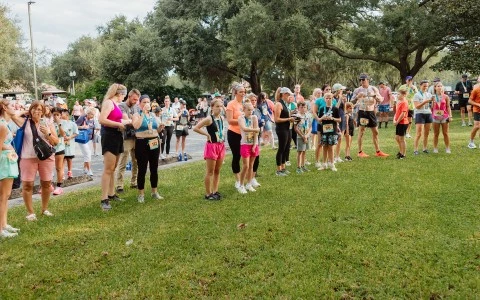 a group of people standing in a line