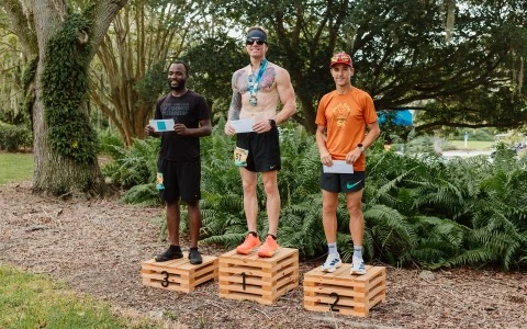 a group of men standing on wooden boxes