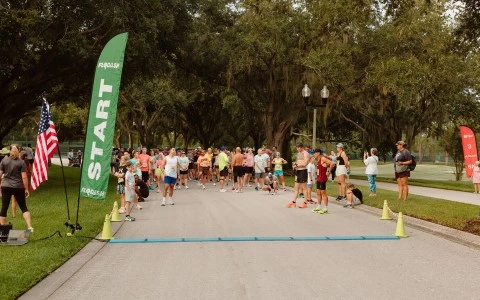 a group of people running on a road