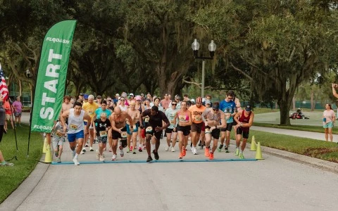 a group of people running on a road