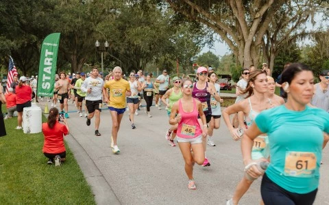 a group of people running on a road