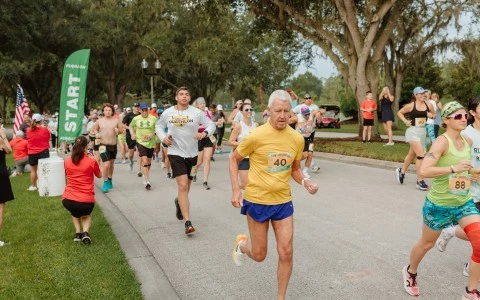 a group of people running on a road