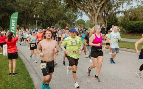 a group of people running on a road