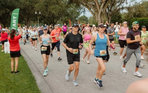 a group of people running on a road