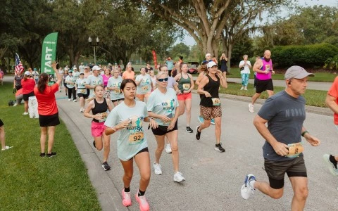a group of people running on a road