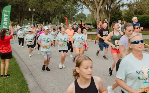 a group of people running on a road