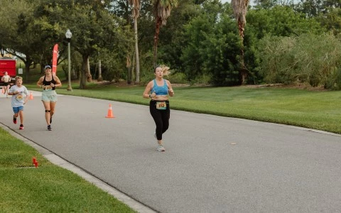 a woman running on a road