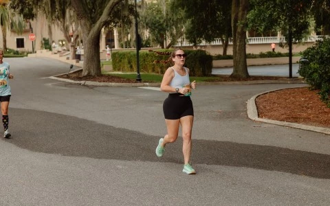 a woman running on a road