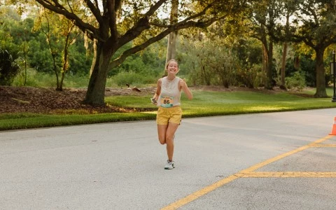 a woman running on a road